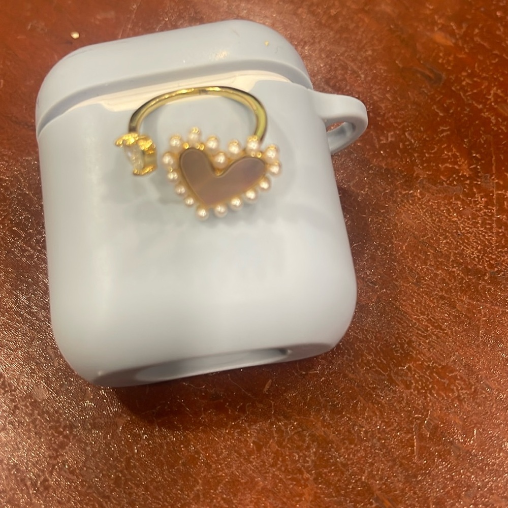 Adjustable ring , mother of pearl.  Never been worn